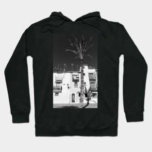 Black and image of typical Mediterranean apartments with tall palm Hoodie